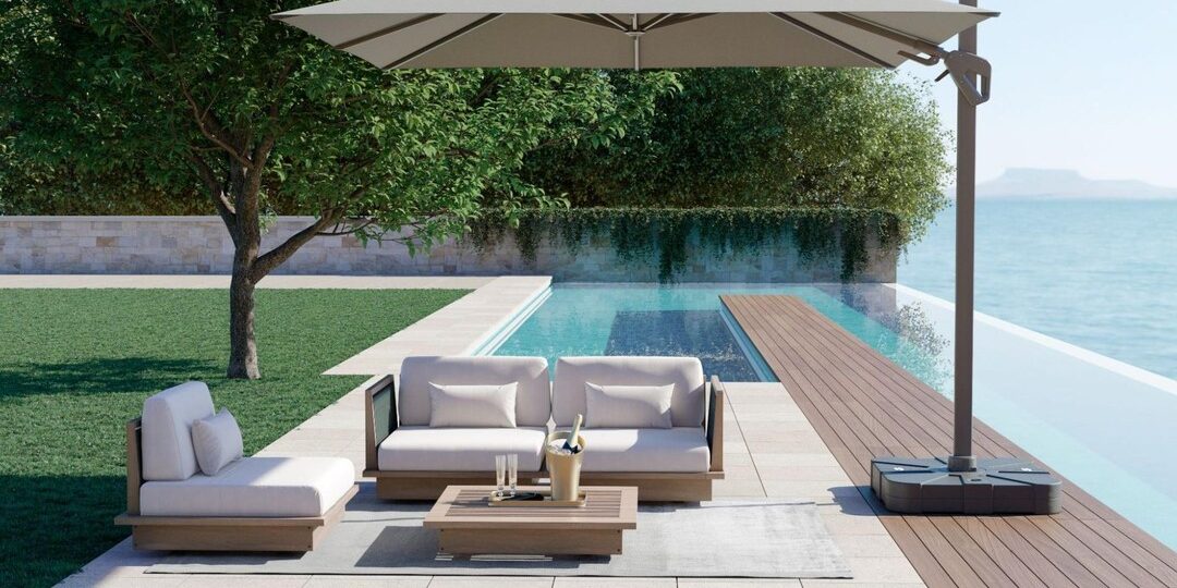 Móveis para área de piscina: conjunto a beira de uma piscina com ombrelone e poltronas